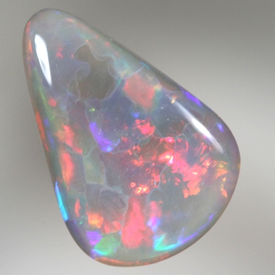 SOLID SEMI BLACK OPAL Bright fire. RARE Jigsaw pattern